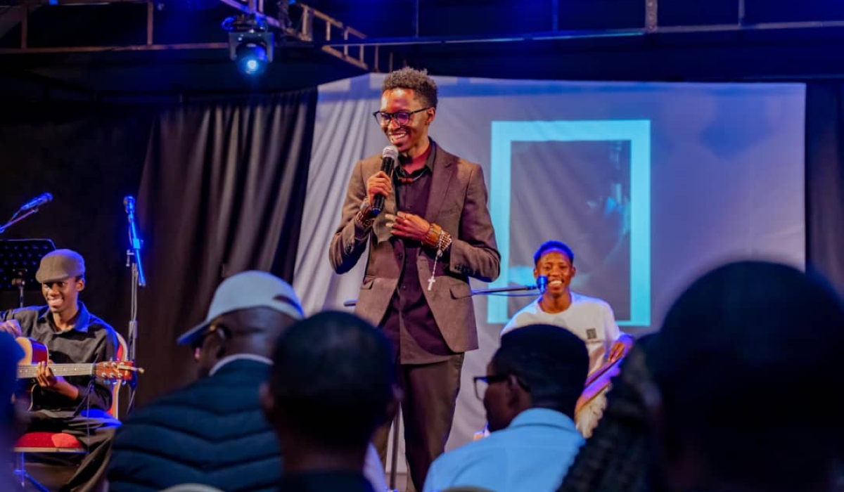 Poet Rumaga speaks during Ibyanzu Vibration Night, the evening of poetry at the Kigali Conference and Exhibition Village,