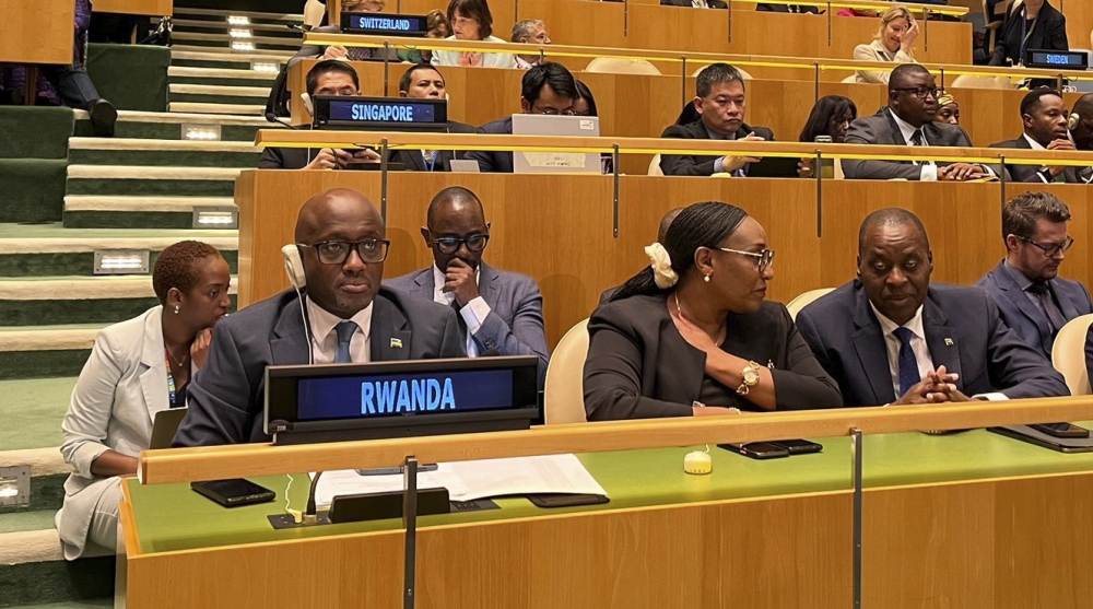 Minister of Foreign Affairs and International Cooperation Olivier Nduhungirehe (L) and members of Rwandan delegation during the United Nations General Assembly, in New York on Sunday, September 22.