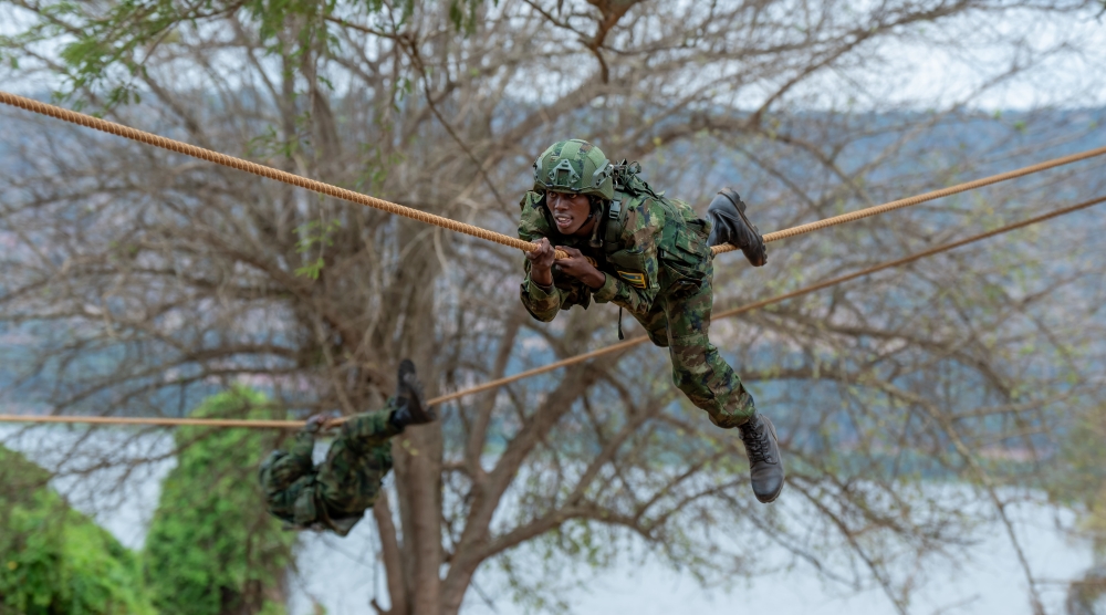 Some of the new recruits showcasing some skills acquired during a six-month training during the pass-out event at the basic military training centre in Nasho, Kirehe District on Sunday, September 22. Courtesy