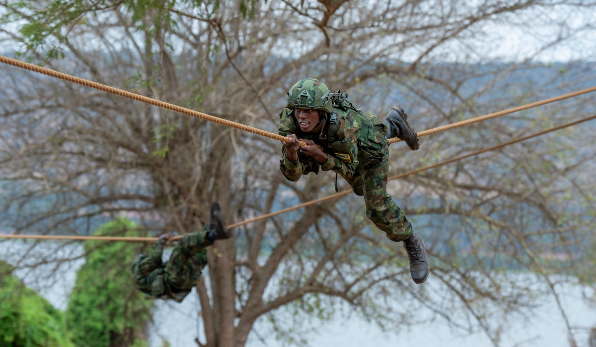 Some of the new recruits showcasing some skills acquired during a six-month training during the pass-out event at the basic military training centre in Nasho, Kirehe District on Sunday, September 22. Courtesy