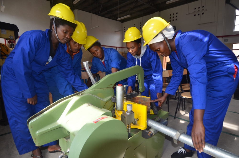 A group of students during a plumbing exercise at Musanze Polytechnique. Photo by Sam Ngendahimana