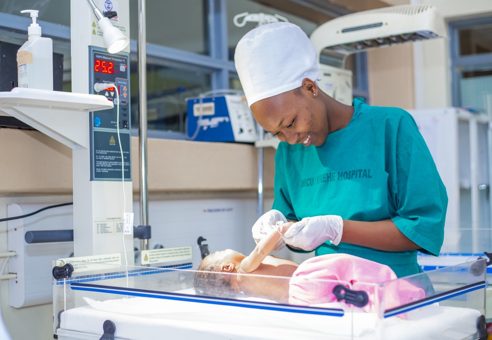 A nurse takes a care of a baby at Kirehe Hospital. National Strategy for Transformation (NST2), confirms access to quality healthcare by quadrupling the number of certified health workers.