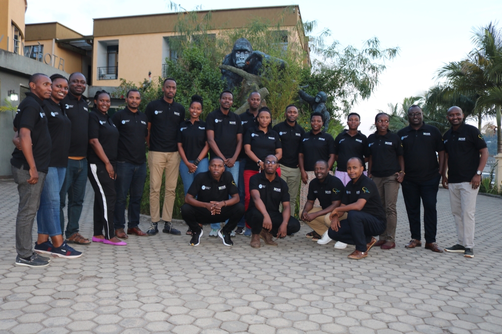 Participants pose for a photo at a  workshop  to assess stakeholder needs and mitigate risk in the development of Internet of Things Remote Monitor