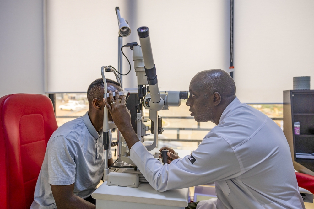 Dr. John Nkurikiye, the Chief Ophthalmologist and Director of Rwanda International Institute of Ophthalmology (RIIO) during an eye screening exercise in Kigali. Photo by Emmanuel Dushimimana