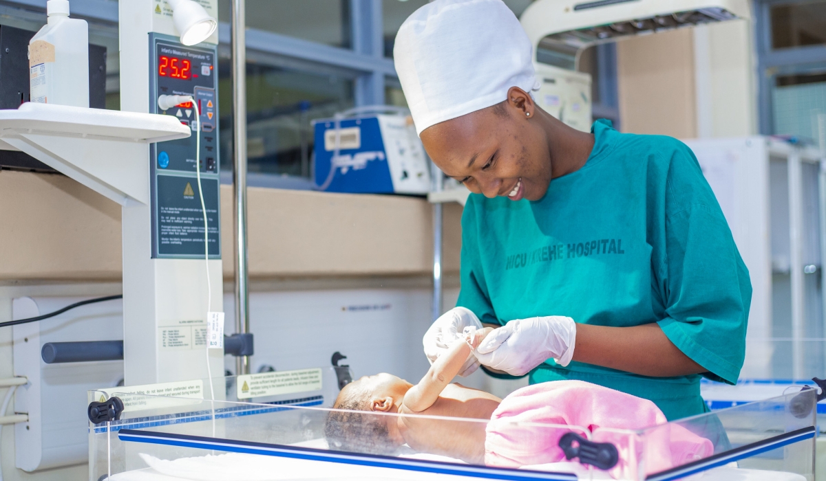 A nurse takes a care of a baby at Kirehe Hospital. National Strategy for Transformation (NST2), confirms access to quality healthcare by quadrupling the number of certified health workers.