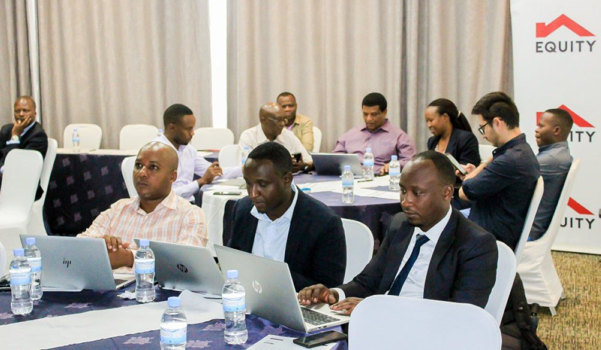 Participants  during the Pact partners&#039; meeting, in Kigali on September 19. The meeting focused on the achievements of the &#039;Illuminating Small-Scale Mining in Rwanda&#039; project, which aims to provide environmentally friendly lighting solutions to small-scale miners. Courtesy