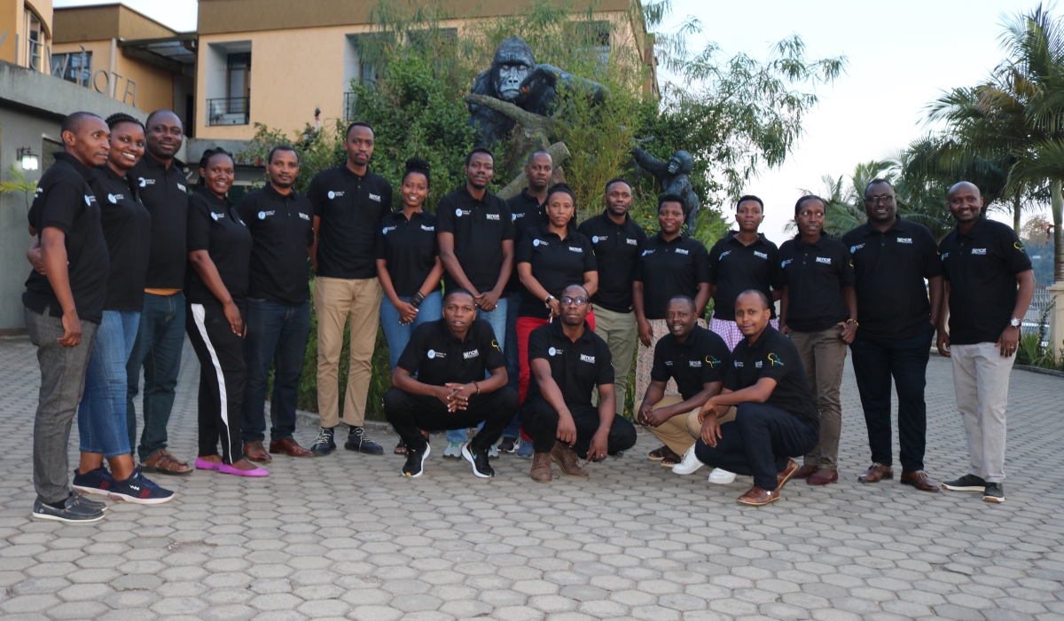 Participants pose for a photo at a  workshop  to assess stakeholder needs and mitigate risk in the development of Internet of Things Remote Monitor