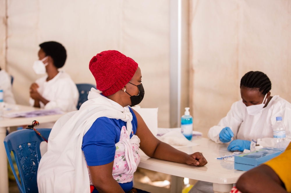 Medics during the Covid-19  vaccination exercise at Gikondo Expo Grounds on August 3, 2021. File