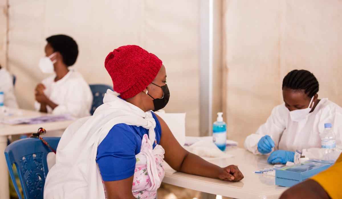 Medics during the Covid-19  vaccination exercise at Gikondo Expo Grounds on August 3, 2021. File