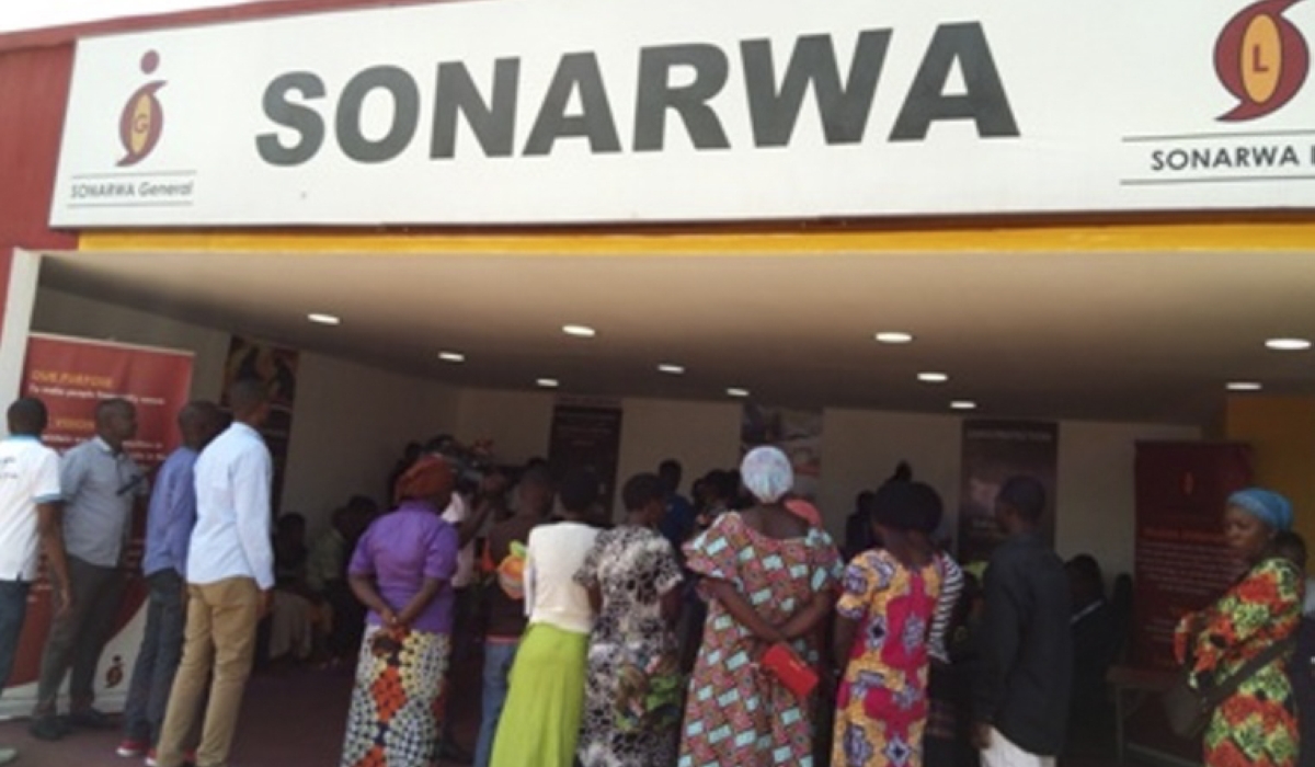 Showgoers at a SONARWA stand during a past trade fair. Sonarwa General Insurance Company Ltd experienced a significant decline in profitability in 2023, reporting a loss of Rwf879 million. File