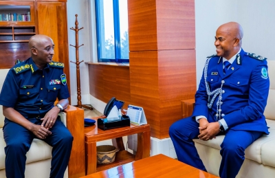 The Inspector General of Police (IGP) Felix Namuhoranye meets his Seychelles counterpart Commissioner of Police (CP) Ted Barbe, at Rwanda National Police  Headquarters on Tuesday, September 24. Courtesy