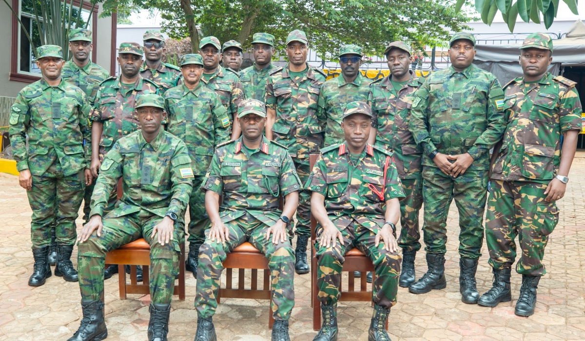 Both delegates pose for a group photo after a meeting in Karagwe District