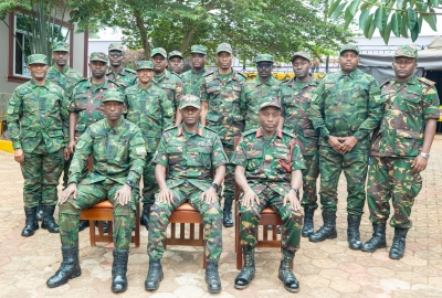 Both delegates pose for a group photo after a meeting in Karagwe District