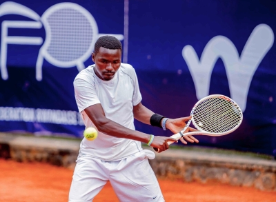 Etienne Niyigena tried hard against American Preston Brown but lost 5-7, 2-6 in Round 32.