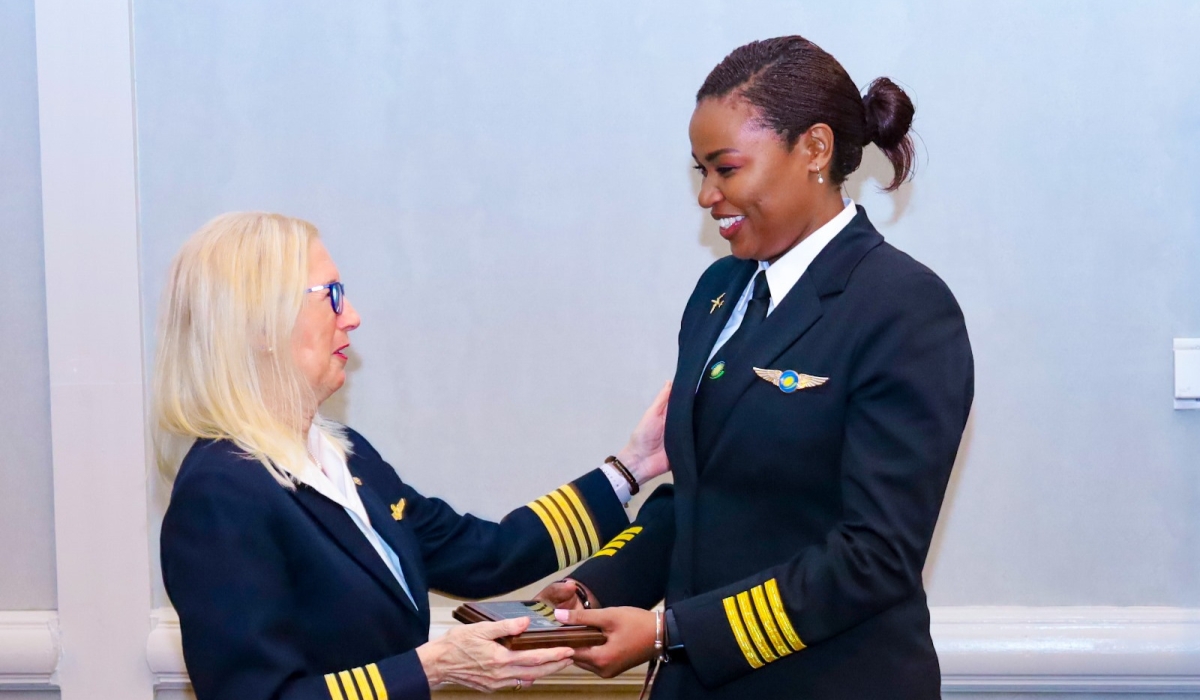 Rwanda’s first female pilot, Esther Mbabazi, receives her certificate during the induction into the Captain’s Club of the International Society of Women Airline Pilots (ISA+21), in Virginia, in US on September 25. Courtesy