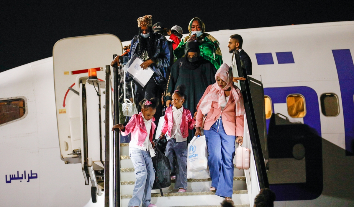 A group of 119 refugees and asylum seekers from Libya arrive at Kigali International Airport on Thursday, September 26. Photos by Dan Gatsinzi