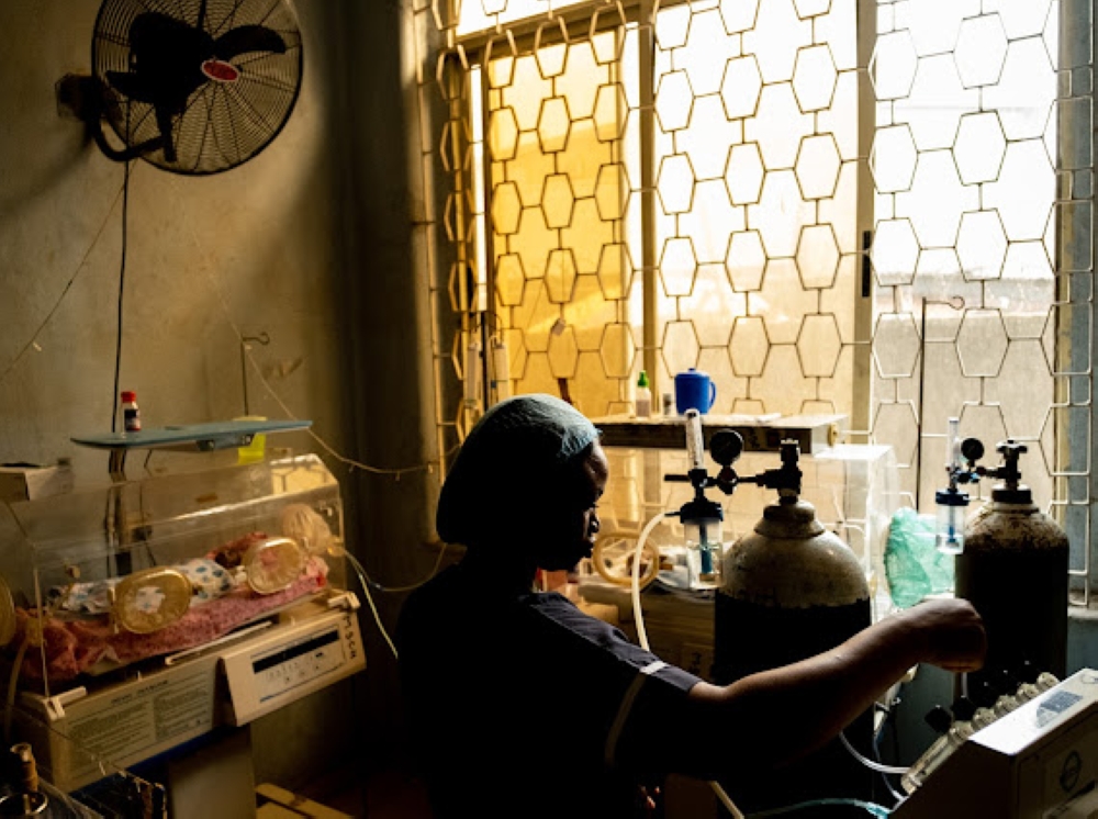 A nurse attends to Chiamaka Ahamba, 9 days old, at the Massey Children's Hospital, Lagos on the 26th January, 2024. Ahamba was admitted pre-term at 26 weeks old and incubated at the hospital. To combat an infection, she was given Cefotaxime antibiotics but it didn't work at the completion of dosage so she was prescribed Meropenem. She is still currently undergoing treatment.