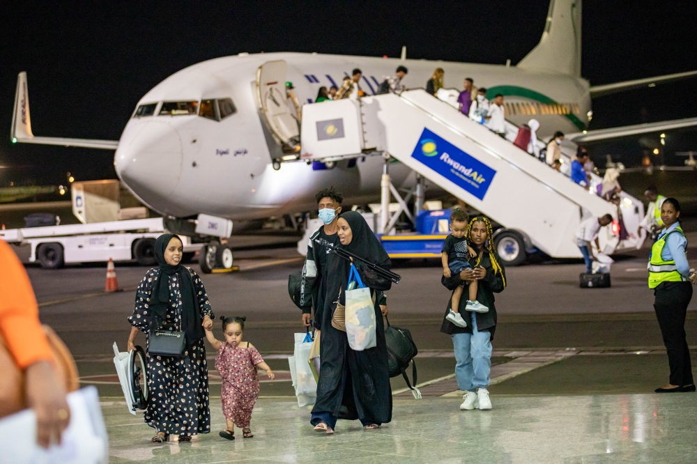 A group of 119 refugees and asylum seekers from Libya arrive at Kigali International Airport on Thursday, September 26. Photos by Dan Gatsinzi