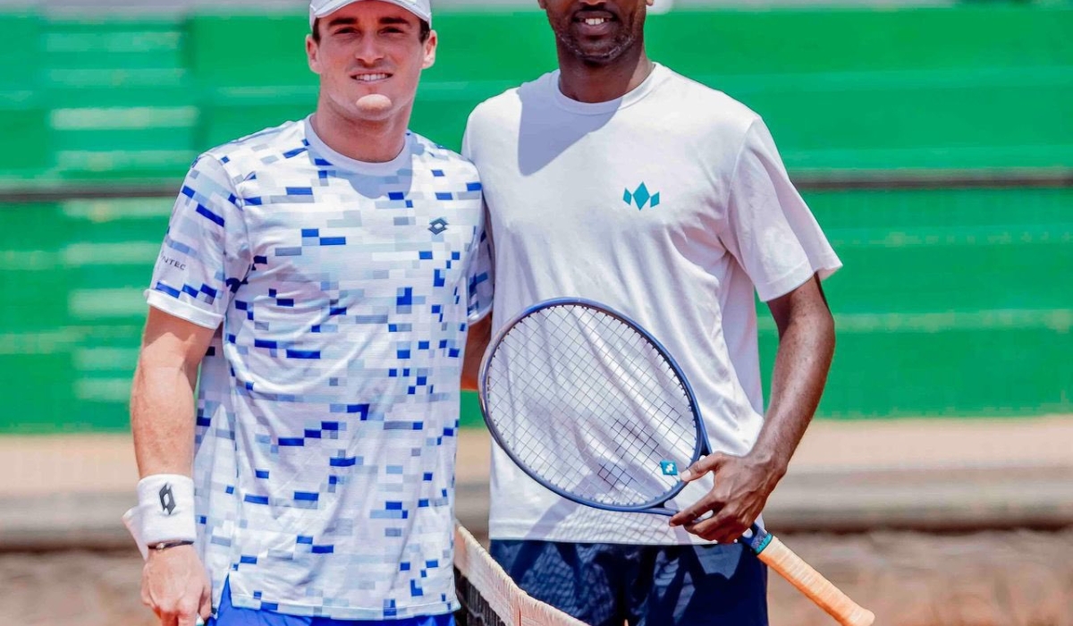 Despite leading his Burundian opponent Guy Orly Iradukunda 7-6(4) in the first set, British tennis player Oliver Crawford (L) abandoned the match due to a back injury-courtesy