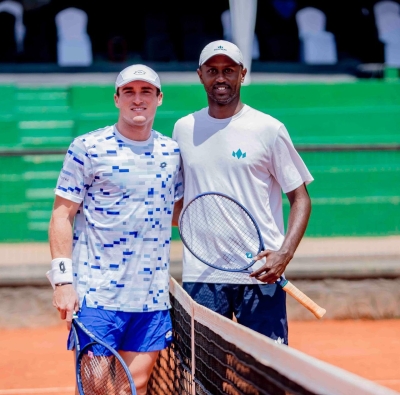 Despite leading his Burundian opponent Guy Orly Iradukunda 7-6(4) in the first set, British tennis player Oliver Crawford (L) abandoned the match due to a back injury-courtesy