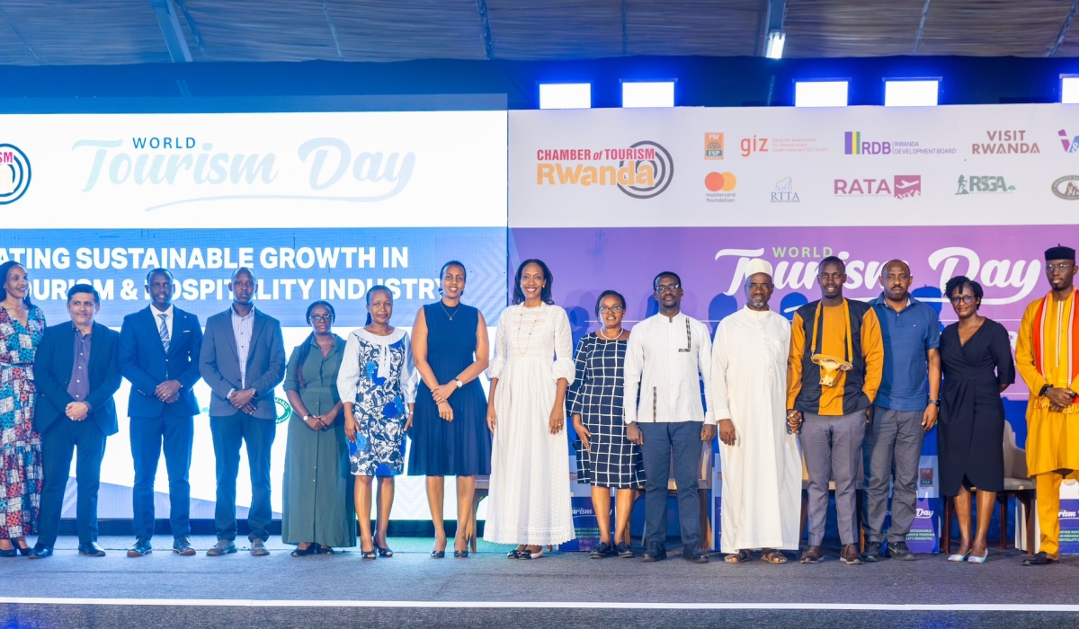 Officials and beneficiaries pose for a photo during the launch of Kataza Programme  on World Tourism Day on September 27.