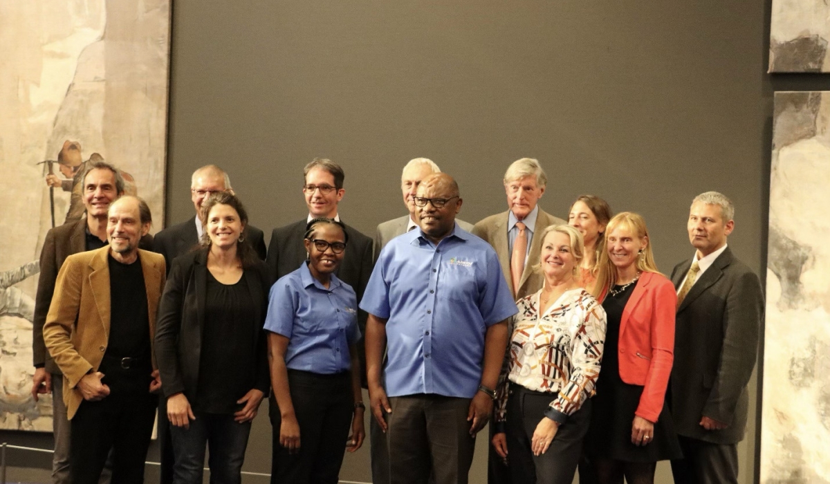 Dr Sam Kanyamibwa, ARCOS Founder and CEO (C) and officials and delegates pose for a photo after receiving the award in Bern, Switzerland. Courtesy