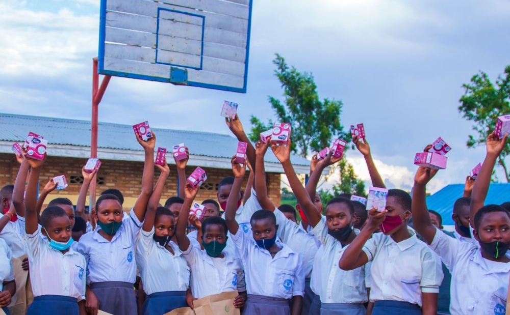 Girls in Gisagara show free pads that they got from an activist. In 2019, the Rwandan government added sanitary pads to the list of goods that are VAT exempted in a bid to ease their affordability. Photos: Courtesy