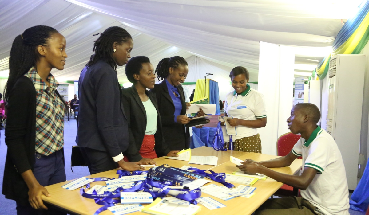 Job seekers follow jobnet Rwanda staff&#039;s guidance while briefing them on job-seeking procedures during an annual event where job seekers meet job providers in Kigali. File