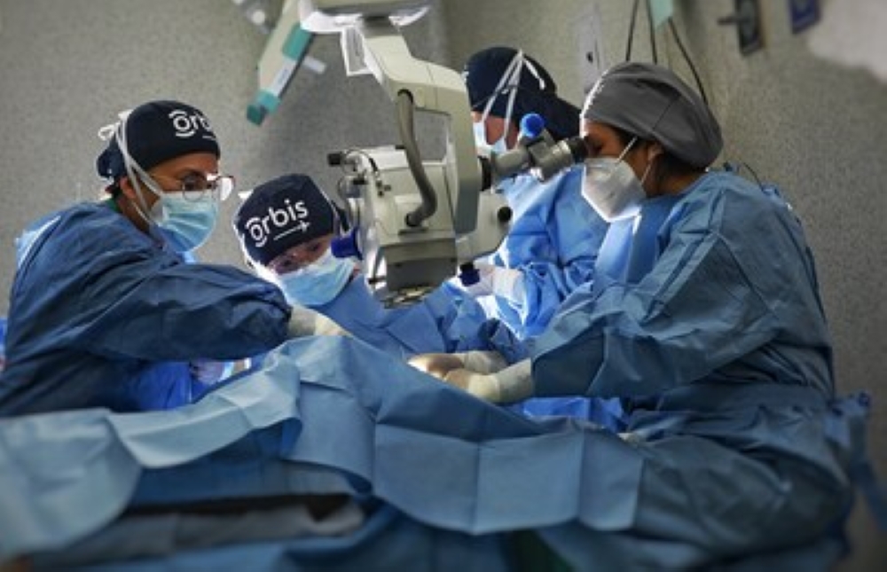 Eye care professionals in Peru build sight-saving skills during an on-site hospital training led by Orbis in 2023. Photo: Geoff Oliver Bugbee