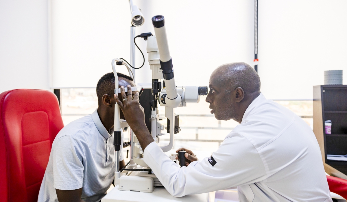 Dr. John Nkurikiye, the Chief Ophthalmologist and Director of Rwanda International Institute of Ophthalmology (RIIO) attends to a patient on  April 24, 2024. File