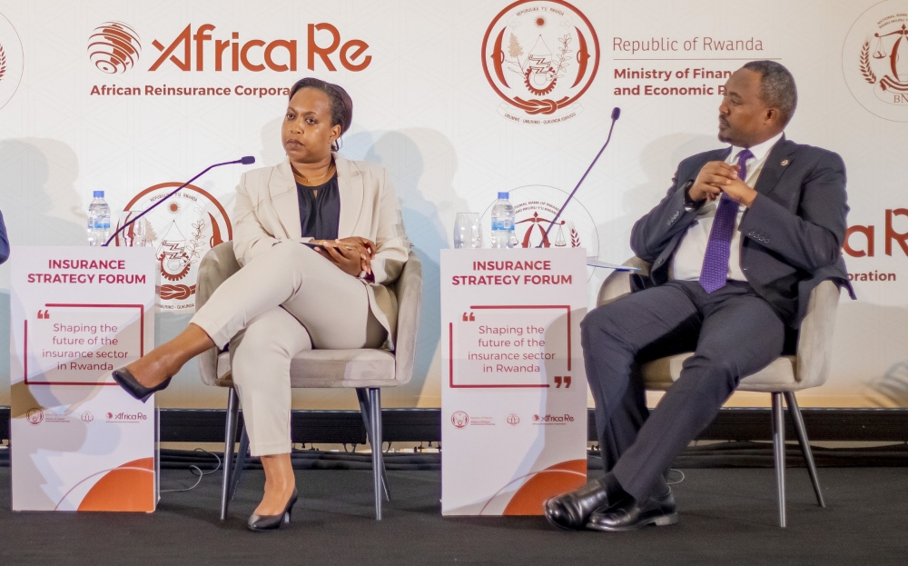 Andrew Kulayige, Chairperson of Rwanda Association of Insurers (ASSAR) and Kampeta Sayizongwa, CEO of the Development Bank of Rwanda (BRD) during  Insurance Strategy Forum in Kigali on October 2.