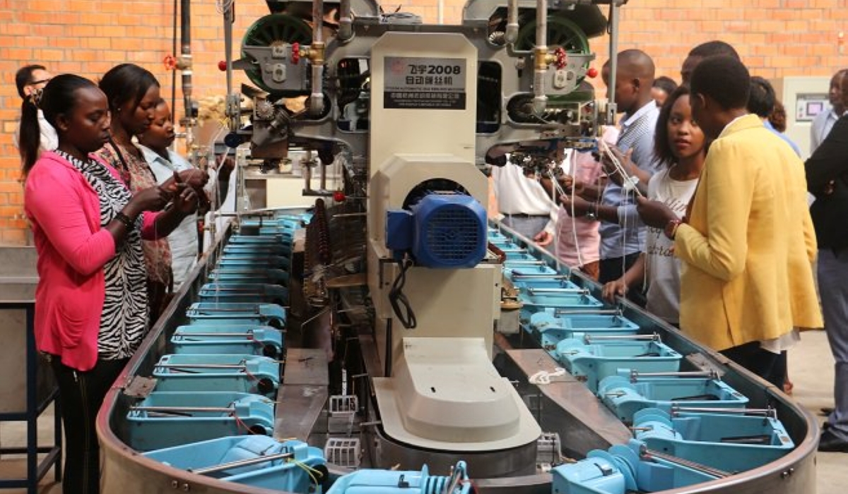 Workers engaged in reeling silk filaments at part of the Rwanda Silk Processing Factory.