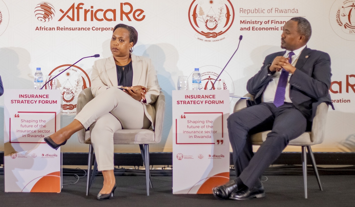 Andrew Kulayige, Chairperson of Rwanda Association of Insurers (ASSAR) and Kampeta Sayizongwa, CEO of the Development Bank of Rwanda (BRD) during  Insurance Strategy Forum in Kigali on October 2.