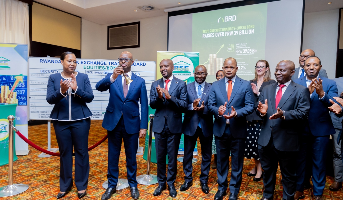 Minister of Finance, Yusuf Murangwa (2nd left), officiates the event as the BRD lists its second tranche of a Sustainability-Linked Bond, worth Rwf 30 billion, on the Rwanda Stock Exchange on Monday, October 7