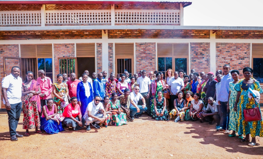 Members of cooperatives and MoneyPhone officials pose for a group photo after a meeting to discuss on how MoneyPhone is transforming access to finance for micro, small, and medium enterprises (MSMEs). Photos by Craish Bahizi