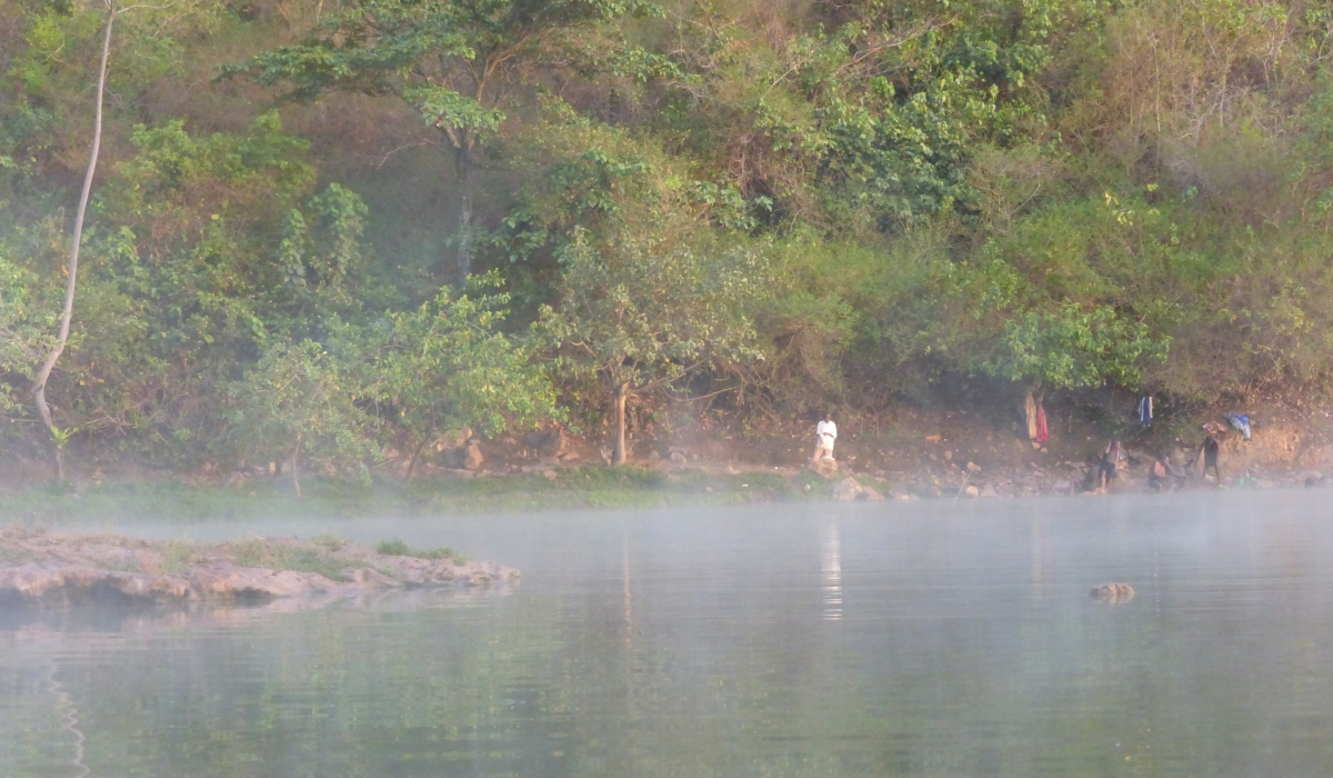 Some people swim in the hot spring in Nyakabuye Sector in Rusizi District. Rwanda is exploring the use of geothermal energy, a form of heat from the Earth&#039;s core. Sam Ngendahimana