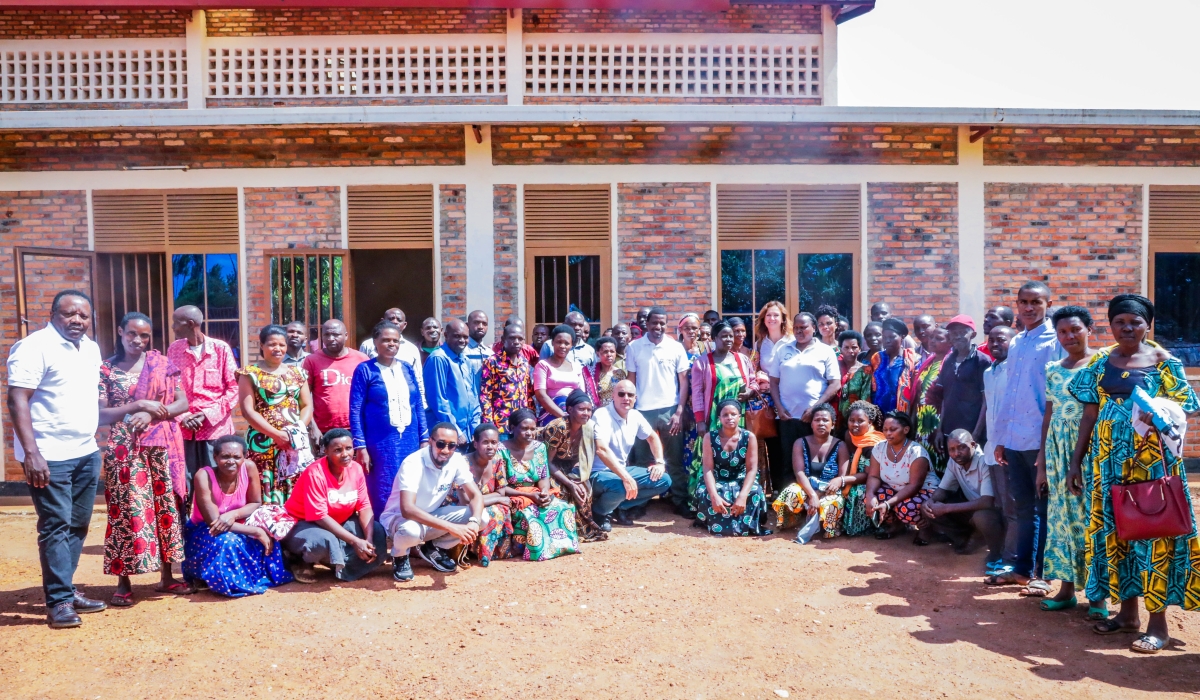 Members of cooperatives and MoneyPhone officials pose for a group photo after a meeting to discuss on how MoneyPhone is transforming access to finance for micro, small, and medium enterprises (MSMEs). Photos by Craish Bahizi