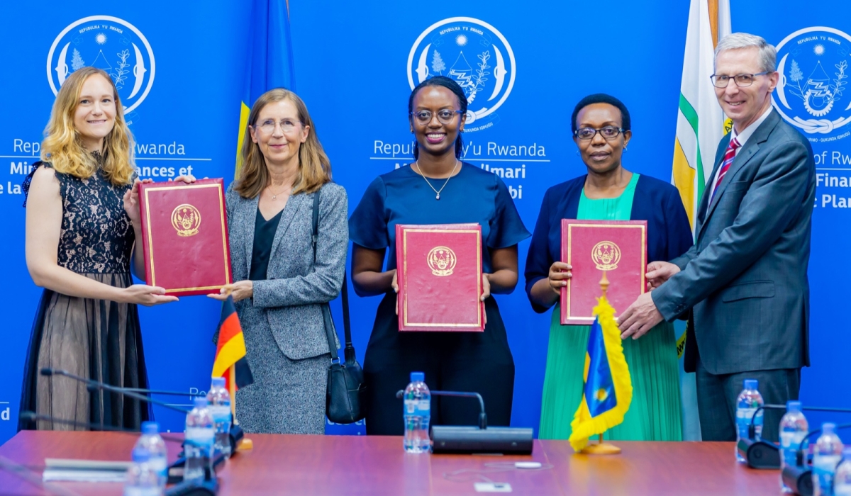 Officials pose for a photo during the signing ceremony in Kigali on Tuesday, October 8. The fund aimed at improving access to public services, rehabilitating infrastructure, creating employment opportunities.