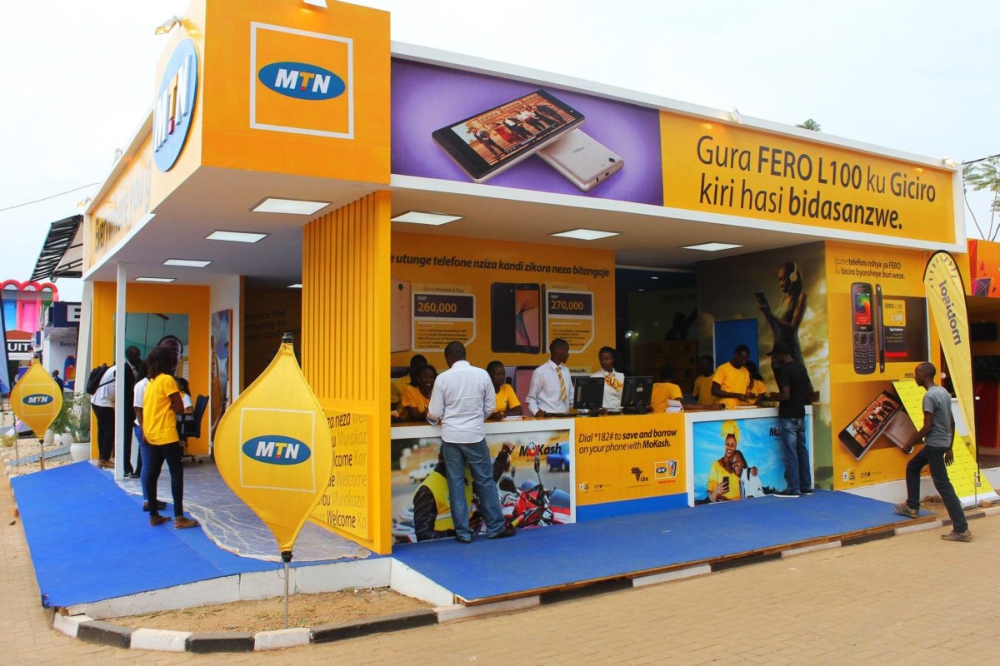 Clients are attended to at an MTN Rwanda stand during a previous expo in Kigali.