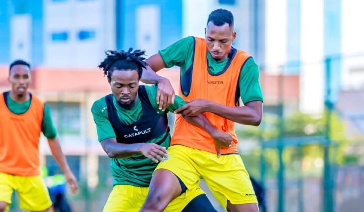 Amavubi midfielders Anicet Ishimwe and Bonheur Mugisha during the training in Benin on October 11.