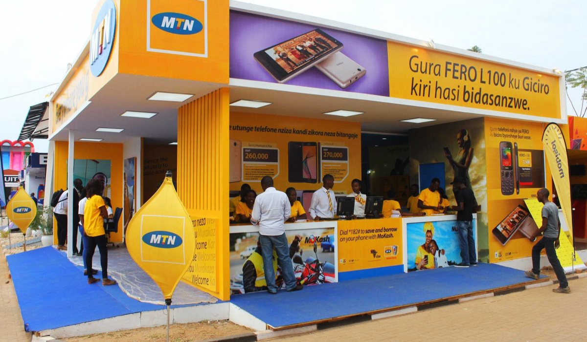 Clients are attended to at an MTN Rwanda stand during a previous expo in Kigali.