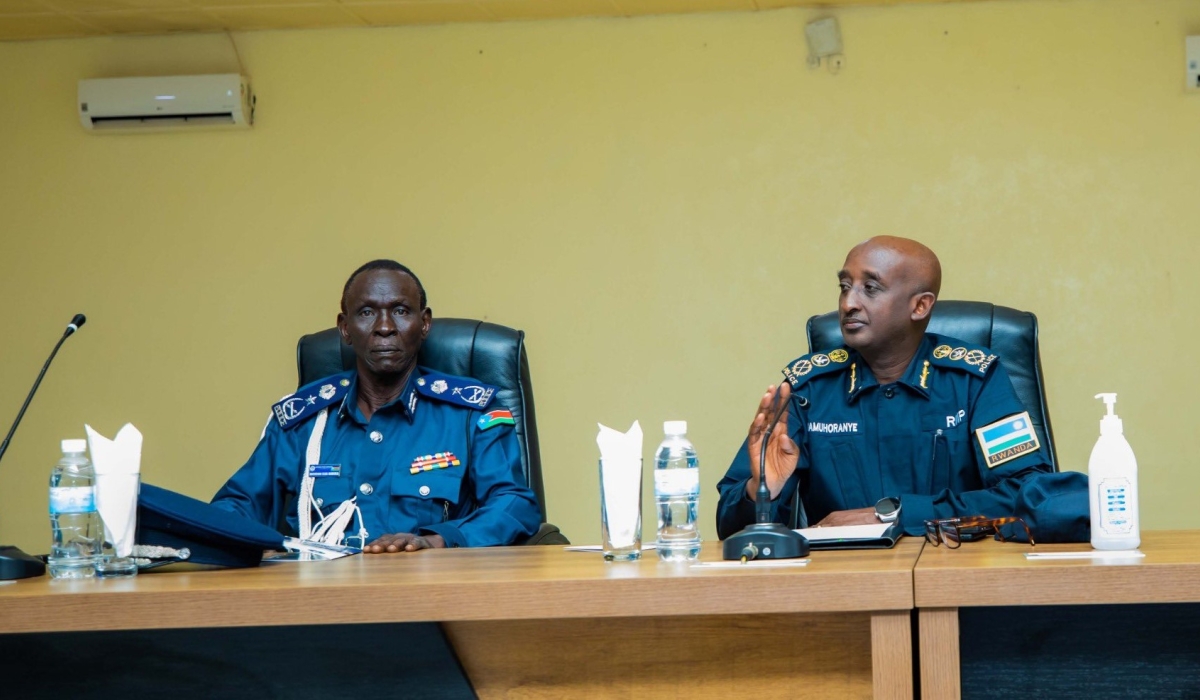 Gen. Jackson Elia, the Assistant Inspector General for Human Resources and Training of SSNPS, Inspector General of Police (IGP) CG Felix Namuhoranye during the accomplishment event  of joint training in aviation security and public order management  on Friday, October 11.