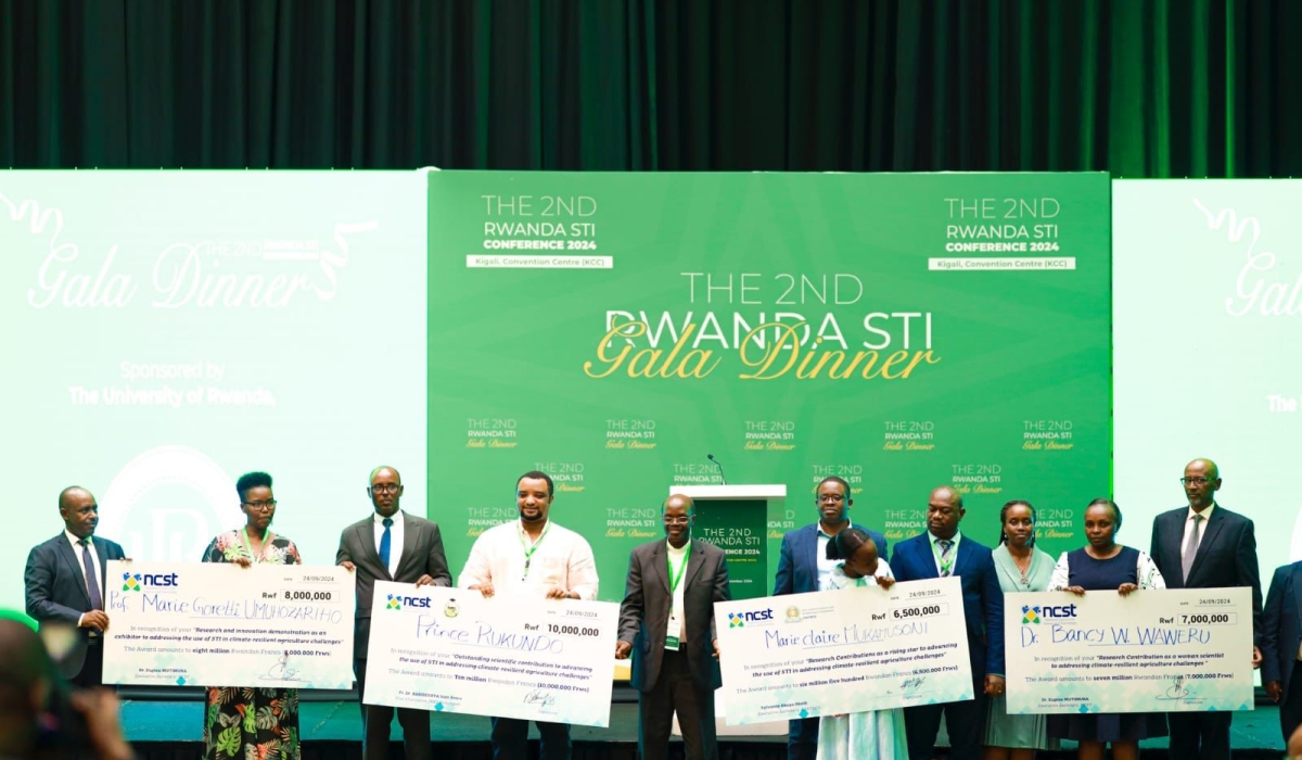 Prince Rukundo, fourth from left, was recognized as the best researcher at the conference. COURTESY