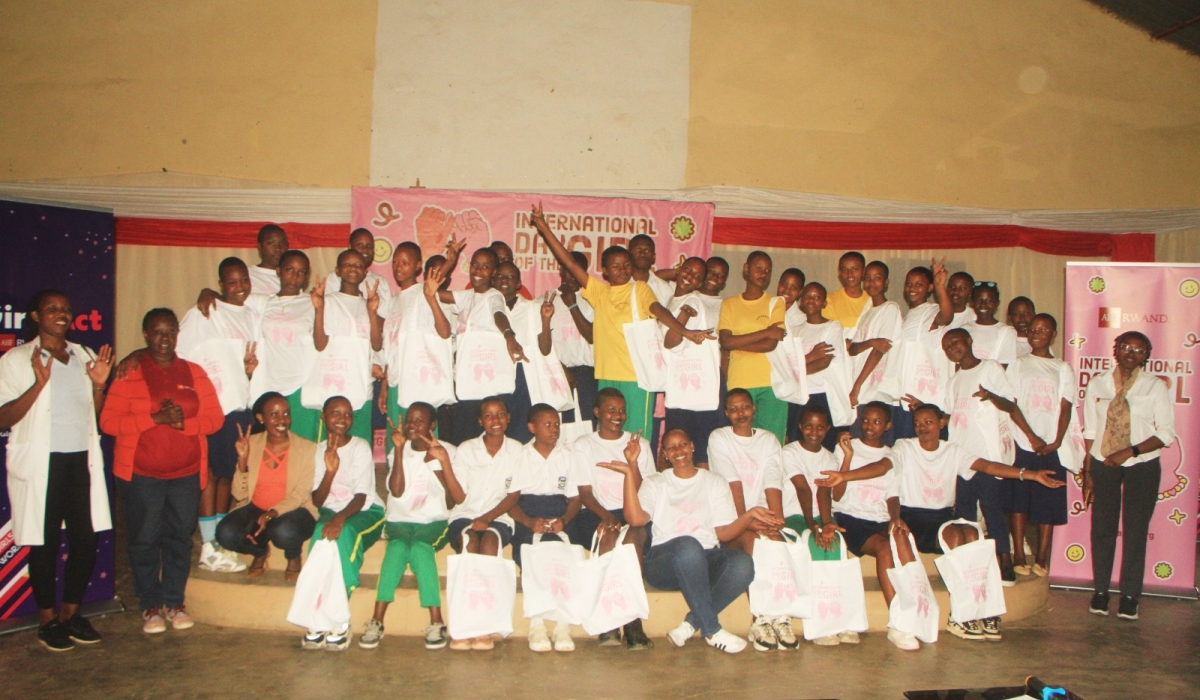 Participants pose for a photo at the celebration of the  International Day of the Girl Child (IDG) on Friday, October 11. AHF highlighted the ongoing challenges faced by girls and young women worldwide, including barriers to education, healthcare, and protection from early pregnancies. Photos by Craish Bahizi