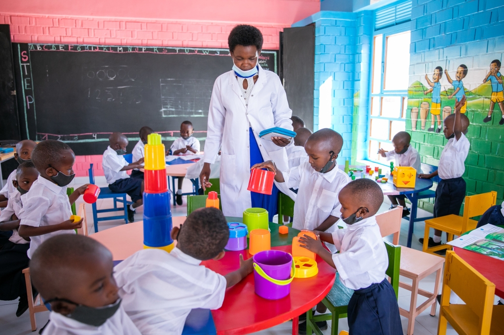 Children during a class at Munini Early Childhood Development (ECD) Centre at Munini Integrated Model Village, Nyaruguru District.  Photo by Olivier Mugwiza.