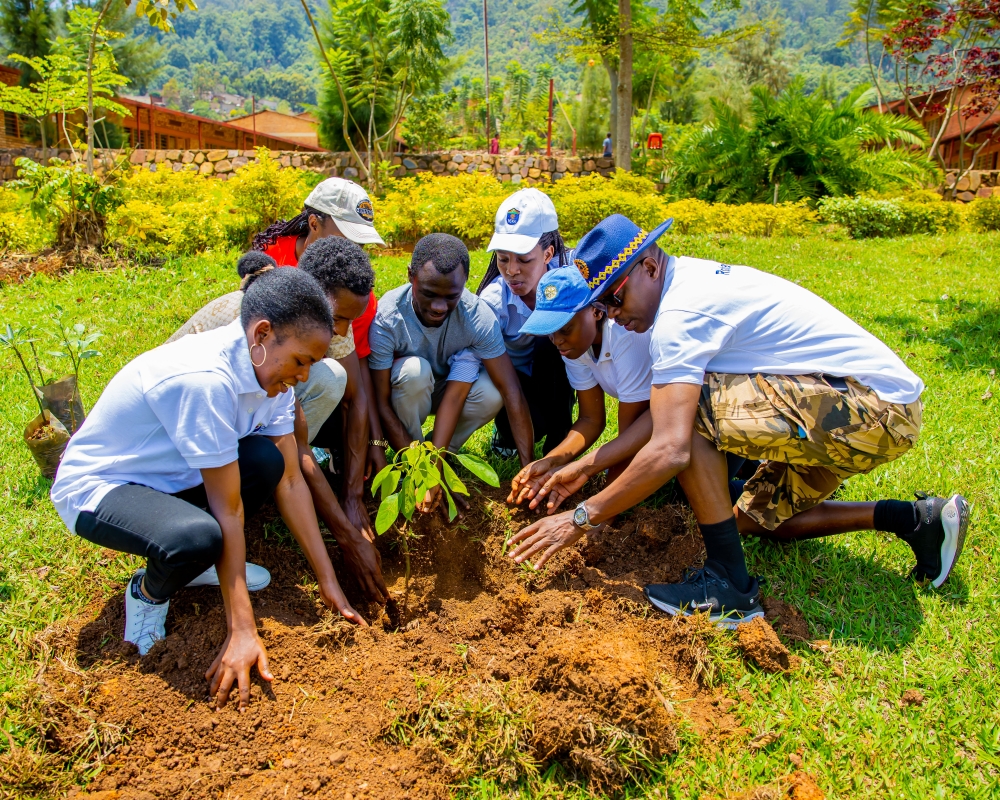 Members of the Rotary Club of Kigali Karisimbi during a tree planting initiative at GS Apace School  on Sunday, October 13. Courtesy