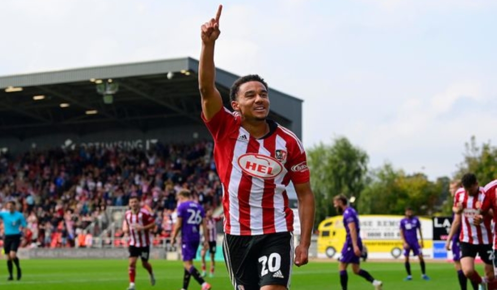 English midfielder Kamari Doyle celebrates during the game. Doyle was born on August 1, 2005, to a Rwandan father and an English-Jamaican mother.