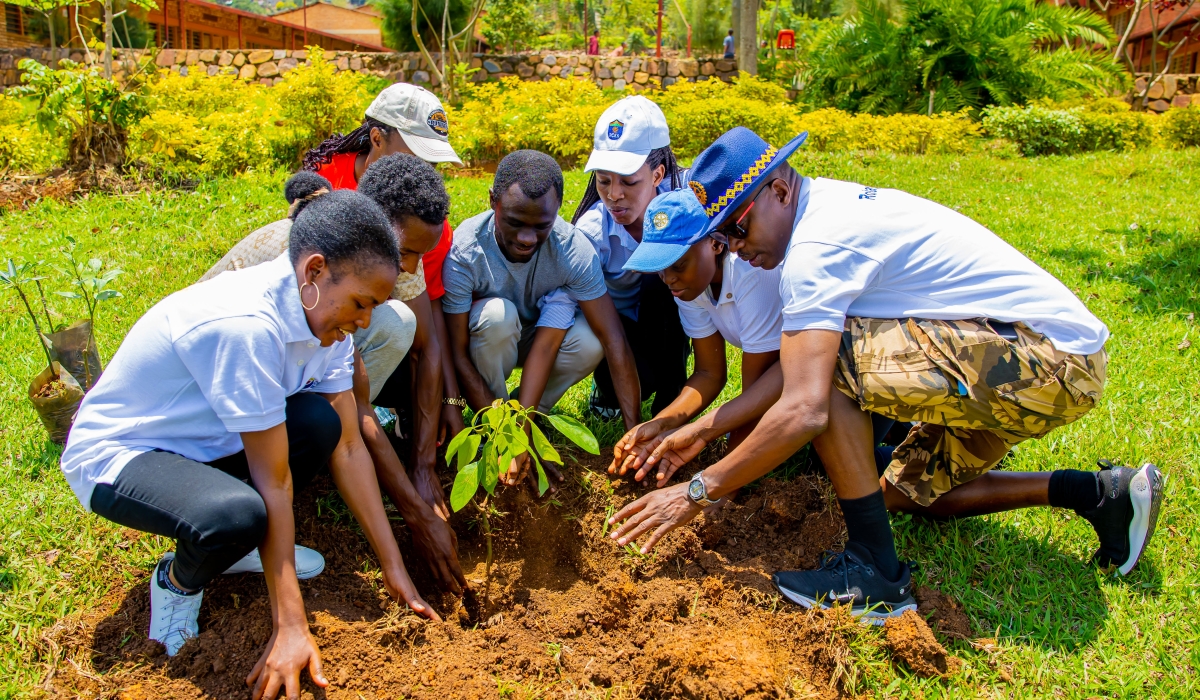 Members of the Rotary Club of Kigali Karisimbi during a tree planting initiative at GS Apace School  on Sunday, October 13. Courtesy