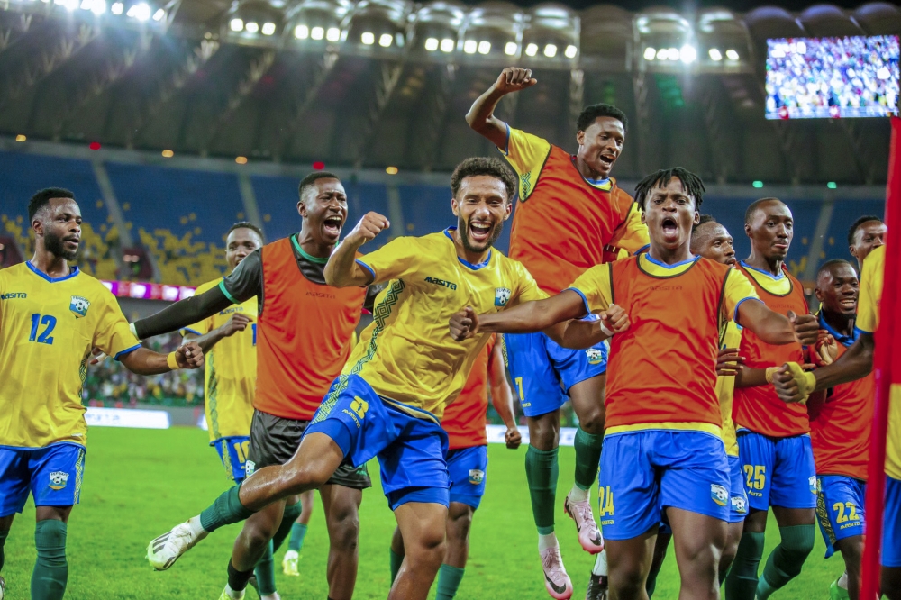 National team players celebrate the crucial victory after defeating  Benin 2-1 at Amahoro Stadium on Tuesday, October 15. Photos by Emmanuel Dushimimana