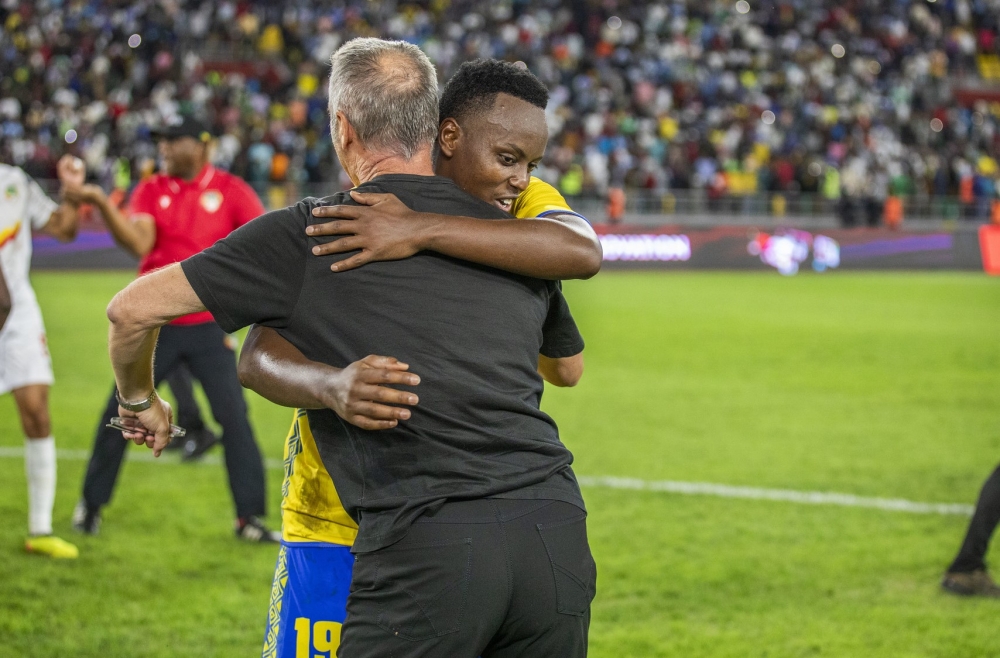 Amavubi head coach Frank Spittler cheers on goal scorer ,striker Innocent Nshuti after a 2-1 victory over Benin at Amahoro Stadium. Photo by Emmanuel Dushimimana